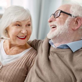 retired-couple-laughing